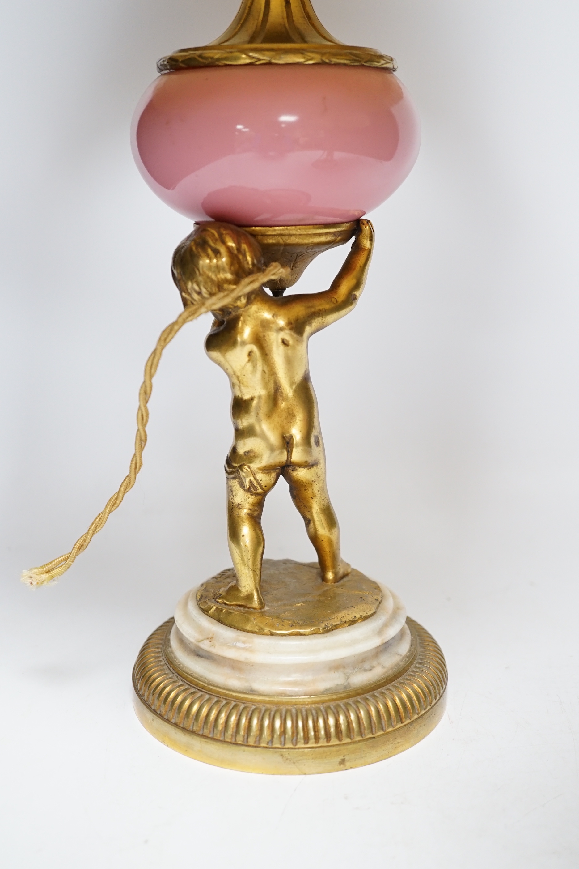 A pair of early 20th century French ormolu and porcelain cherubic lamps, one signed L. Kley, 48cm including shade